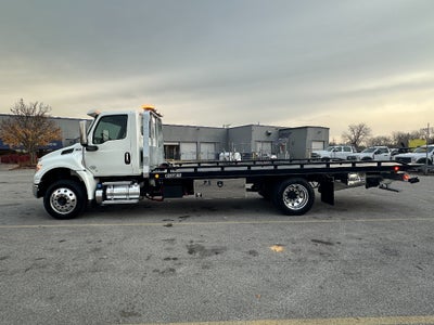 2025 International MV607 WITH A CENTURY 21' STEEL CARRIER