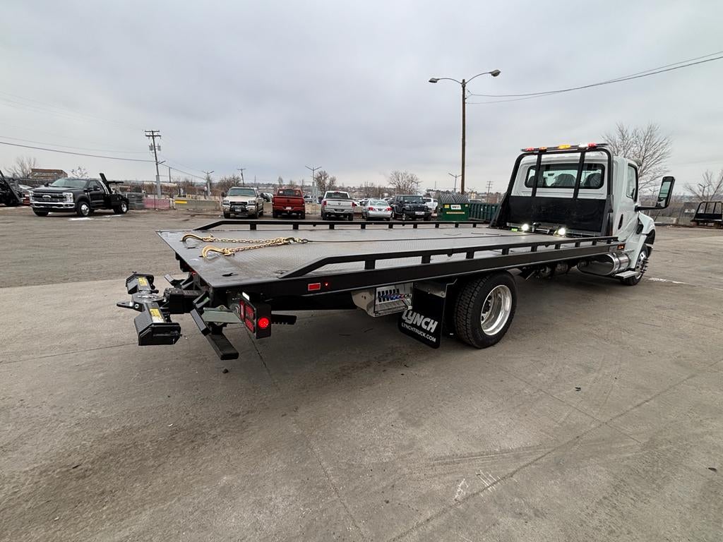 2025 International MV607 w/ Century 12S Carrier