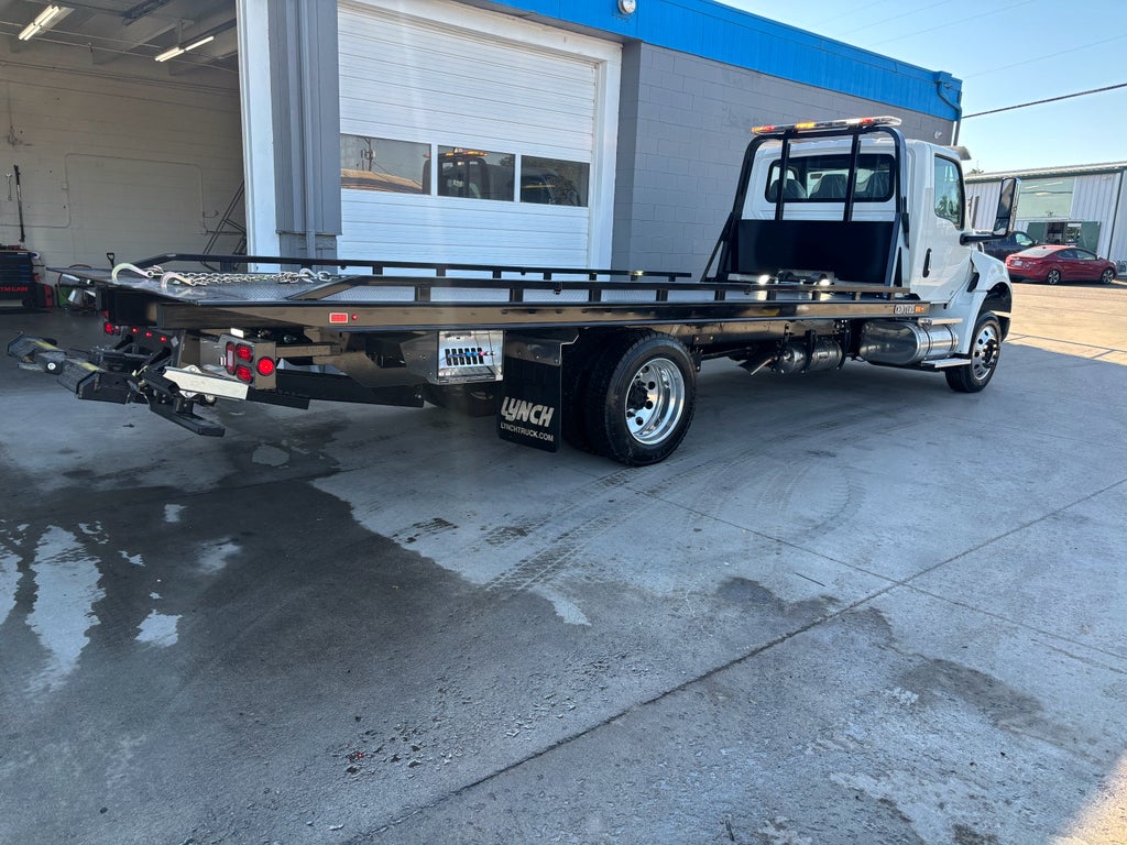 2025 International MV607 w/ Century 12S Carrier